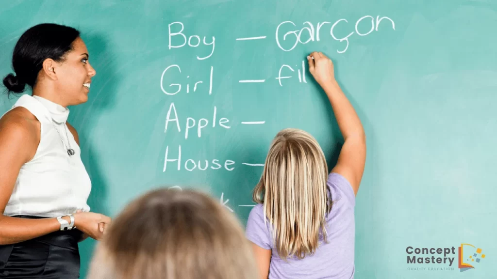 Child writing french on green board